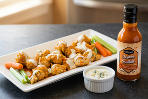 Sesame Buffalo chicken meatballs based on your photo, with the Global Wok bottle, carrots, celery, and blue cheese